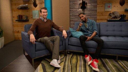 Kid Cudi Wears a Denim Shirt and Red Sneakers Kid Cudi Wears a Denim Shirt and Red Sneakers