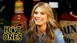 Heidi Klum Strikes a Pose While Eating Spicy Wings Heidi Klum Strikes a Pose While Eating Spicy Wings