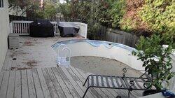 Bye Bye Above Ground Pool, Hello Raised Cabana-Style Deck Bye Bye Above Ground Pool, Hello Raised Cabana-Style Deck