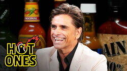 John Stamos Falls Out of His Chair While Eating Spicy Wings John Stamos Falls Out of His Chair While Eating Spicy Wings