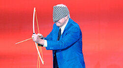 Optics, Glass, and a Rubberband Man Optics, Glass, and a Rubberband Man